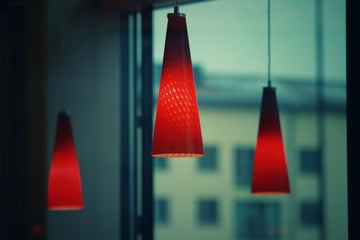 Warm pendant lamps in a quiet interior
